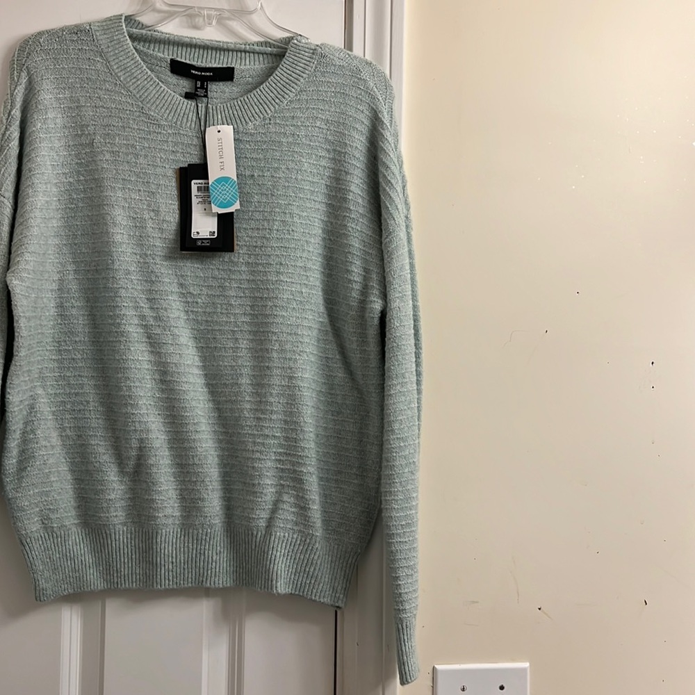 Mint colored soft sweater size small, brand new tags still on!